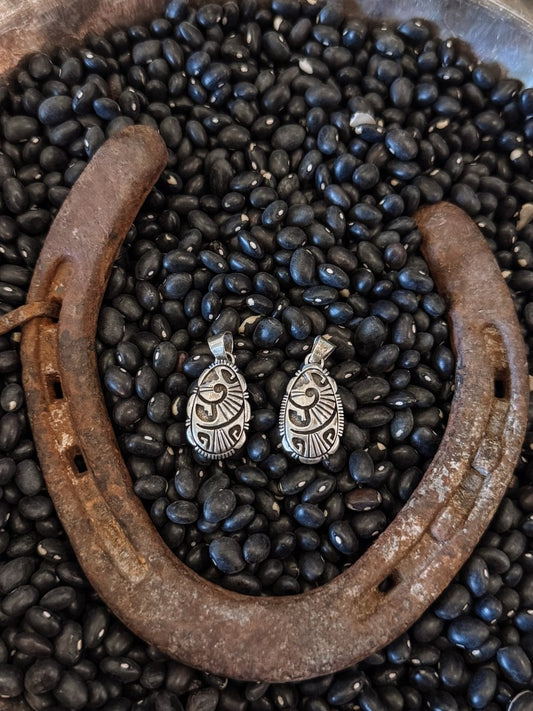 Showman Silver Pendant